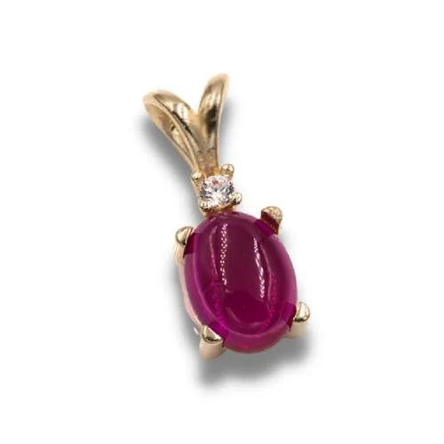 Lab Created Ruby 8x6mm Oval Cabochon Accented Pendant